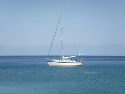 a sail boat in the middle of the ocean at 3 Piéces confort climatisé vue mer, 4 personnes à Saint-Jean Cap Ferrat à proximité de monaco et menton in Saint-Jean-Cap-Ferrat