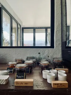 a room with a bunch of bowls and vases on display at Escondida in Nice