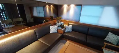 an overhead view of a leather couch in a restaurant at Yacht Charter Nice Cannes Antibes in Nice