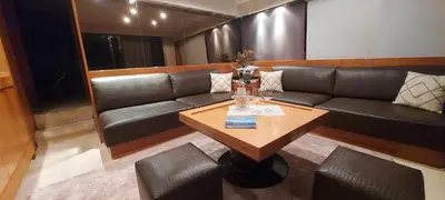 a living room with a couch and a table at Yacht Charter Nice Cannes Antibes in Nice