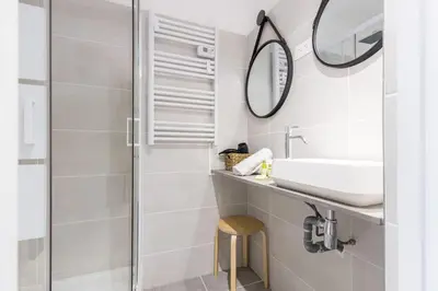 a bathroom with a sink and a mirror at MY CASA - GROSSO 4 - Studio with Balcony - Near the Sea in Nice