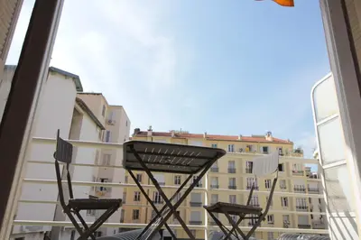 a view of a building from a balcony at Red studio Buffa in Nice