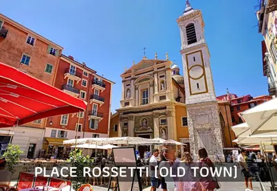 a clock tower in the middle of a street at Coeur Vieux Nice - Place Rossetti in Nice