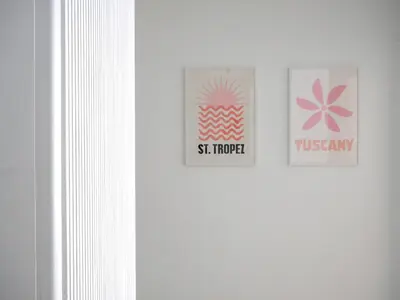 two signs on the door of a white refrigerator at Ker Riviera in Nice
