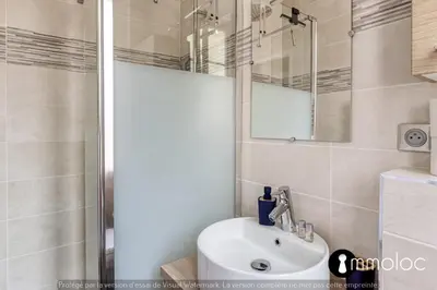 a bathroom with a shower and a white sink at Hyper central studio 2 minutes walk from 