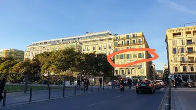 a large orange object is hanging over a city street at Spacious 3 BR flat Nice center - magnificent view in Nice