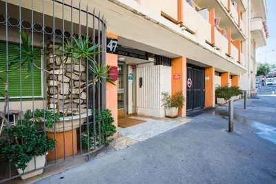 a building with plants on the side of it at Passy Azur AP4242 by Riviera Holiday Homes in Nice