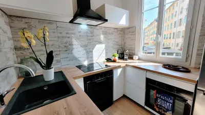 a kitchen with a sink and a counter top at Ze Perfect Place - Confortable appartement 2 CHB - Asc - Port - Garibaldi in Nice