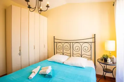 a bedroom with a bed with two towels on it at LE FOCH AP4244 By Riviera Holiday Homes in Nice