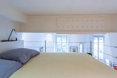 a bedroom with a large bed in a room at Happyfew Liberty in Nice