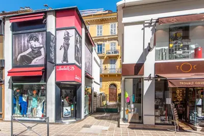 a group of shops on a city street at Happyfew Liberty in Nice