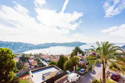 arial view of a town with a view of the water at Terrace on the Bay 2 Villefranche-sur-Mer, AP4243 by Riviera Holiday Homes in Villefranche-sur-Mer