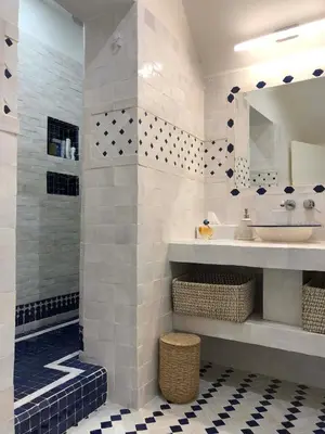 a bathroom with a sink and a mirror at Petit Palace in Old Nice in Nice