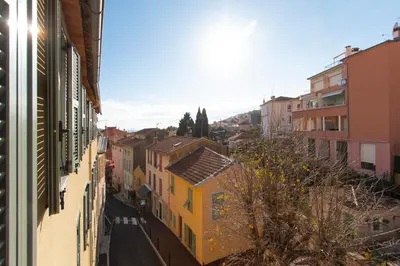 a view of a city street with buildings at Maison Bianchi - Villefranche in Villefranche-sur-Mer