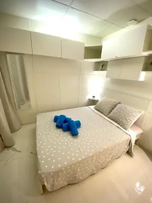 a bedroom with a bed with bluebottles on it at LE ROCAMARE -Superb-Atypical Sea view-A.C-WIFI in Nice