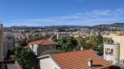 a view of a city from the roof of a building at Villa Lina Zoï in Nice