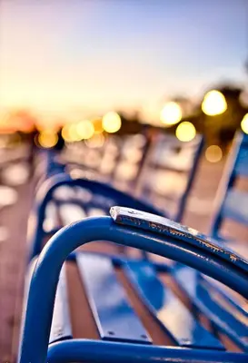 a group of benches sitting on a pier at Swiss Star - Easy Home Booking in Nice