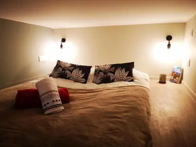 a bedroom with a bed with pillows on it at A & K luxury appartments Port de Nice Garibaldi in Nice