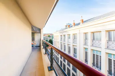a balcony with a view of a building at PALAIS LIBERTE 4 AP4253 By Riviera Holiday Homes in Nice