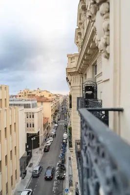 a view of a city street with cars parked at Jacuzzi-Nice quartier des musiciens-Loft in Nice