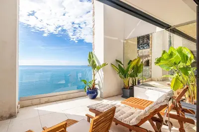 a balcony with a view of the ocean at Superbe appartement Cap de nice in Nice