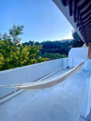 a view from the roof of a house at Appartement Luxe - 3 pièces avec vue mer, piscine et tennis in Nice