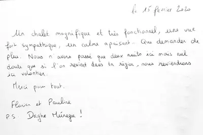 a piece of handwritten handwriting on a white paper at Le Chalet de la Pierreraie Côte d'Azur Piscine Terrasse et Vue Mer in Drap