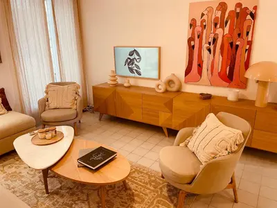 a living room with a couch and a table at Nice Renting - PAGANINI - Spacious Apartment - 2 BedRooms - King Bed - Bathtub - Heart of Nice in Nice