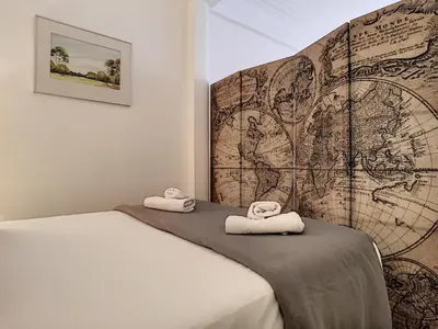 a bedroom with a bed with towels on it at Nestor&Jeeves - MARIA BEACH - Central - By sea in Nice