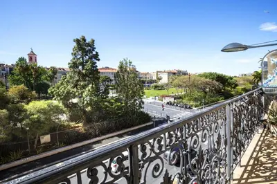 a view of a city from a balcony at Balcon vue Coulée Verte. Luxe Plein cœur de Nice in Nice