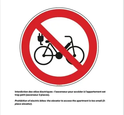 a sign that reads no bikes allowed with a red circle at Chambre d hôte avec clim terrasse et petit déjeuner Hauteurs de Nice in Nice