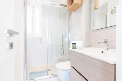 a bathroom with a shower and a toilet and a sink at MY CASA - PROM 163 - 2 rooms with terrace Promenade des Anglais in Nice