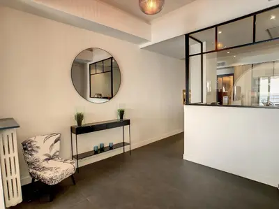 a dressing room with a chair and a mirror at Nestor&Jeeves - BLUE PROMENADE - Sea front - Central - Luxe in Nice