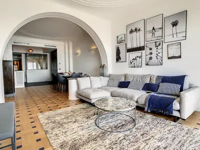 a living room with a couch and a table at Nestor&Jeeves - BLUE PROMENADE - Sea front - Central - Luxe in Nice