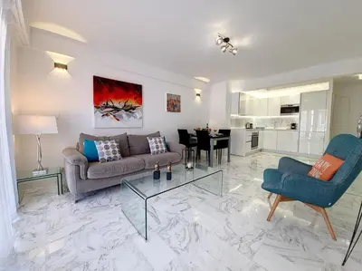 a living room with a couch and chairs and a table at Nestor&Jeeves - FLOREAL BEACH - Central - Close sea in Nice