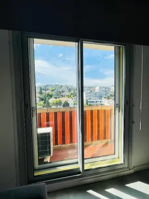 a window in a room with a view of a city at Nice Promenade 2 in Nice