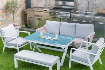 a patio with a table and chairs in a kitchen at GROUND FLOOR VILLA GRAZIELLA 200 M FROM THE BEACH in Èze