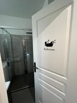 a door to a bathroom with a shower at Gorgeous 2 bedrooms holiday apartement in Nice