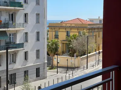 a view of a city street from a balcony at Gorgeous 2 bedrooms holiday apartement in Nice
