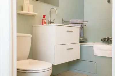 a bathroom with a white toilet and a sink at Apart Nissa Bella Centre / Promenade des Anglais in Nice