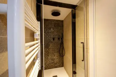 a shower in a bathroom with a glass door at 06A2 - Heart of Old Nice beautiful renovated apartment in Nice