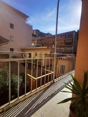 a balcony with a fence and some buildings at Herold Riviera in Nice