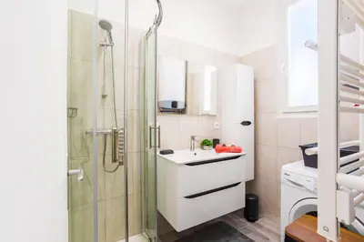 a bathroom with a sink and a shower at LE TIVOLI II AP4282 By Riviera Holiday Homes in Nice