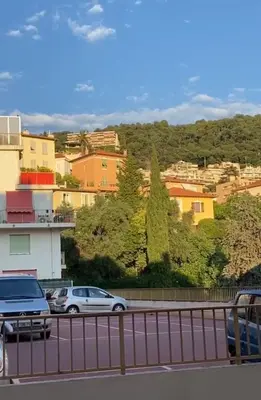 a view of a city with cars on a highway at Appartement entier. Nice Riquier in Nice