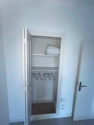 a bathroom with a closet with hangers at Bel appartement pour vos séjours sur la côte in Nice
