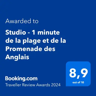 a screenshot of a phone with the text awarded to studio minute die la place at Studio - 1 minute de la plage et de la Promenade des Anglais in Nice