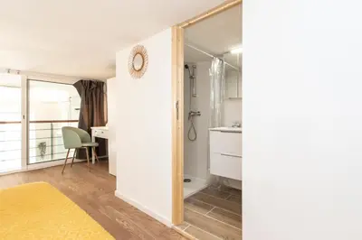 a room with a bathroom with a sink and a mirror at Maison Bianchi - Prefecture - Old Town in Nice