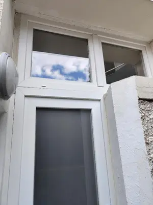 a door with a window with the sky in it at Loft Magnan - PARKING - idéal couples -BEACH -TRAM & Supermarkets - New & Confort-AC in Nice