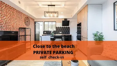 a beach private parking self check in a living room at Loft Magnan - PARKING - idéal couples -BEACH -TRAM & Supermarkets - New & Confort-AC in Nice