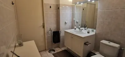 a bathroom with a toilet and a sink and a shower at Studio Le Grand Bleu Fshh in Nice